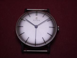 Cyma Dummie für Schaufenster bestehend aus Gehäuse, Zifferblatt, Zeigern, Krone & Federstegen 