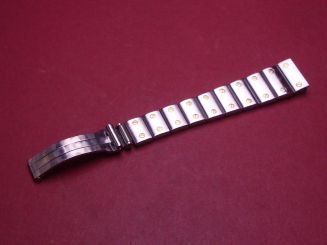 Cartier Armbandhälfte mit Faltschließe und Gehäuse-Anstoßglied, Stahl/Gold, Breite: 14mm-10mm, Länge (nur Glieder): 6,6cm, Glieder sind gewölbt und seitlich verschraubt, gebraucht 