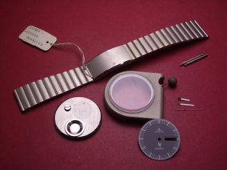 Dugena Lip Bausatz bestehend aus Gehäuse mit Glas und Deckel, Zifferblatt, Zeigersatz, Krone, zwei Federstegen und Armband 