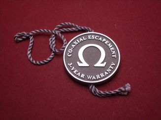 Omega Hang Tag, Ø 29,8mm, silber-grau 