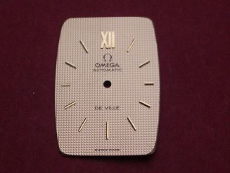 Omega Zifferblatt, ca. 19,9mm x 28,0mm, gold mit goldfarbenen Inlays, für De Ville 