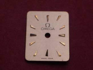 Omega Zifferblatt, ca. 12,5mm x 15,5mm, gold mit goldfarbenen Inlays 