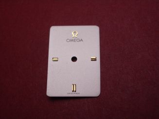 Omega Zifferblatt, ca. 13,6mm x 19,9mm, silber mit goldfarbenen Inlays 