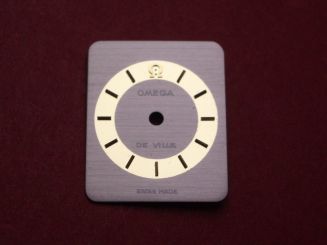 Omega Zifferblatt, ca. 15,0mm x 18,0mm, silber/gold mit goldfarbenen Inlays, für De Ville 