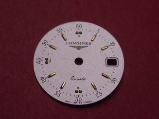 Longines Zifferblatt, Ø 19,46mm, silber mit goldfarbenen Inlays, leicht beschädigt 