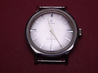 Cyma Dummie für Schaufenster bestehend aus Gehäuse, Zifferblatt, Zeigern, Krone & Federstegen 