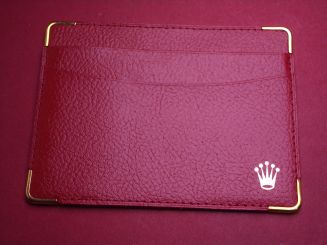 Rolex Leder-Etui, "MONTRES ROLEX S.A. GENEVE SWITZERLAND Code 101.60.55", strukturiert, rot 