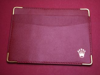 Rolex Leder-Etui, "MONTRES ROLEX S.A. GENEVA SWITZERLAND Code 101.60.55", glatt, rot 