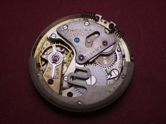 Uhrwerk Movado Cal. 115, Hammerautomatik, Zentralsekunde, ohne Aufzugswelle 