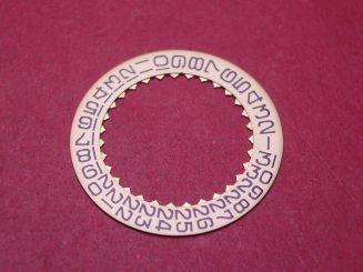 Movado Datumscheibe, für Kaliber 538, Datum bei der 3, schwarze Schrift auf gelbem Grund, NOS (New Old Stock) 