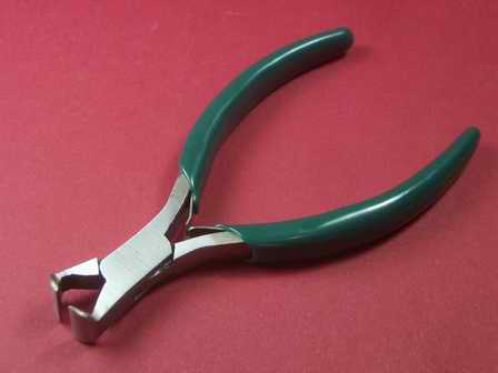 Kopfschneider Werkzeug mit grün beschichteten Griffen 