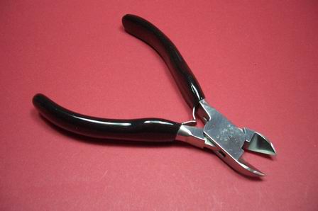 Seitenschneider Werkzeug mit braun beschichteten Griffen 