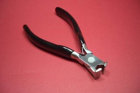 Kopfschneider Werkzeug mit braun beschichteten Griffen 