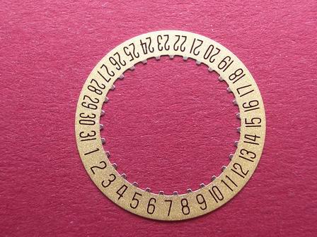 ETA Datumsscheibe, Kaliber 256.111, schwarze Schrift auf goldenem Grund,  Datumsfenster bei der 6 
