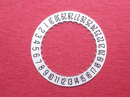 ETA Datumsscheibe, Kaliber 256.111, schwarze Schrift auf silbernen Grund,  Datumsfenster bei der 6 