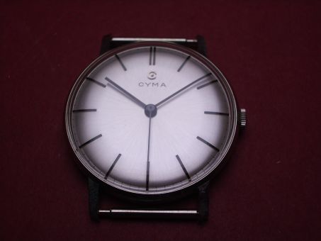 Cyma Dummie für Schaufenster bestehend aus Gehäuse, Zifferblatt, Zeigern, Krone & Federstegen 