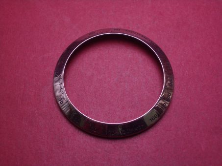 Lünette mit Tachymeter, Stahl, Außen-Ø 42,7mm, Innen-Ø 34,6mm, Höhe 4,0mm, gebraucht 