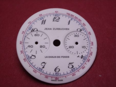Valjoux 69, emailliertes Chronographen-Zifferblatt, Ø 24,3mm, mit der Beschriftung: JEAN ZURBUCHEN LA CHAUX-DE FONDS SWISS MADE 