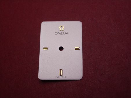Omega Zifferblatt, ca. 13,6mm x 19,9mm, silber mit goldfarbenen Inlays 
