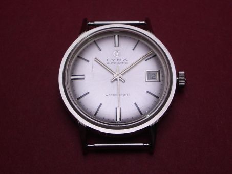 Cyma Dummie für Schaufenster bestehend aus Gehäuse, Zifferblatt, Zeigern, Krone & Federstegen 