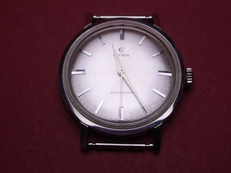 Cyma Dummie für Schaufenster bestehend aus Gehäuse, Zifferblatt, Zeigern, Krone & Federstegen 