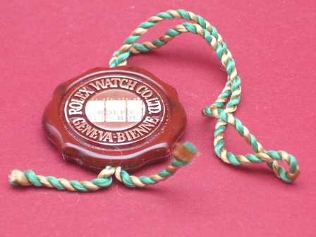 Rolex Chronometer-Siegel, rot/hellgrüne Kordel mit Buchstaben Hologramm 