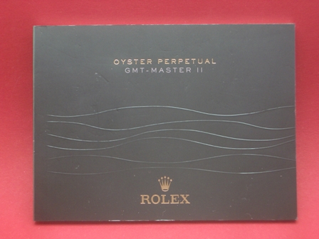 Rolex GMT-Master II Booklet NOS mit verschiedenem Druckdatum als Zubehör 